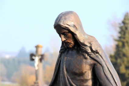 Statue of Jesus Sad about Catholic Mutual Funds